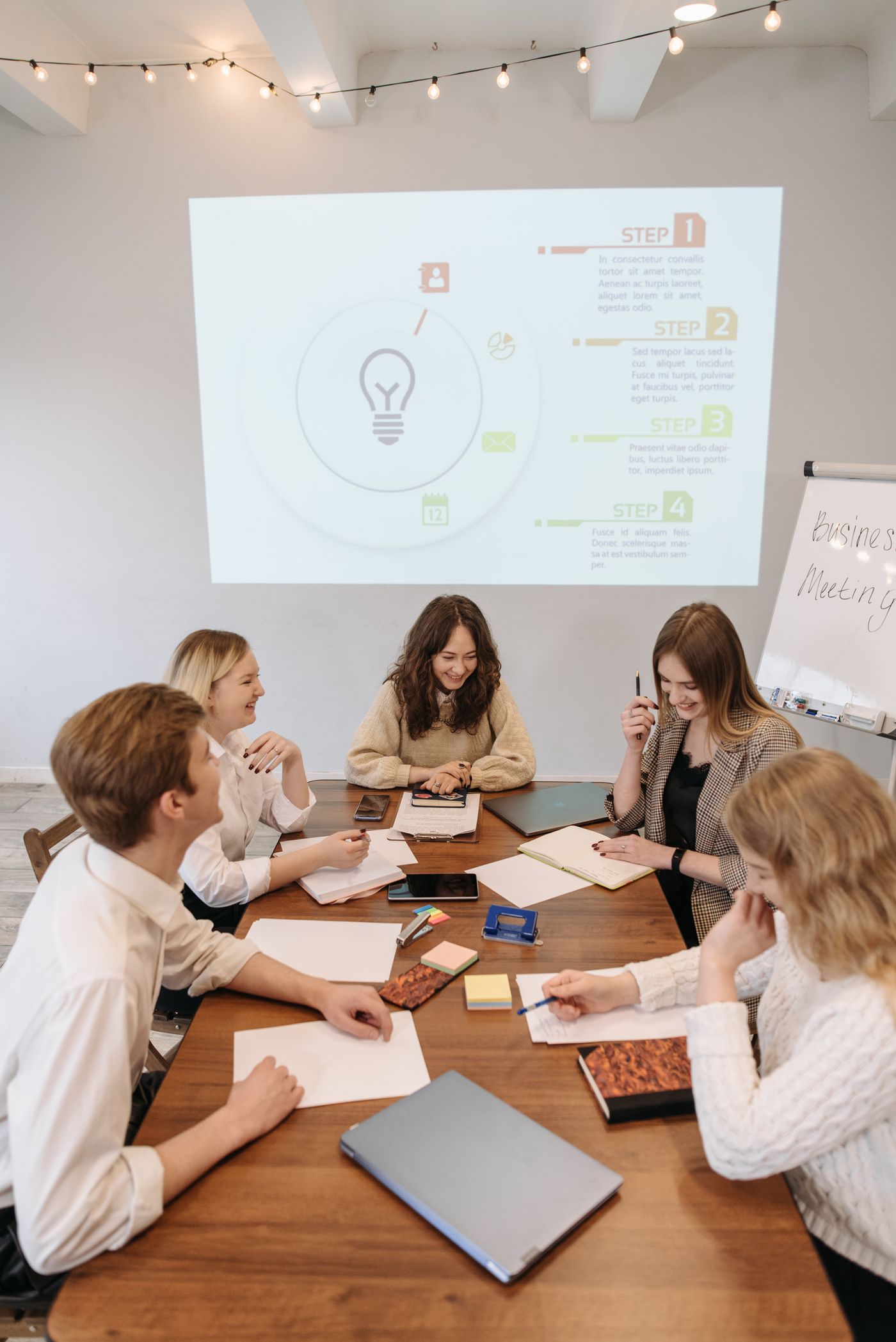 Stock photo of professionals collaborating around a conference table